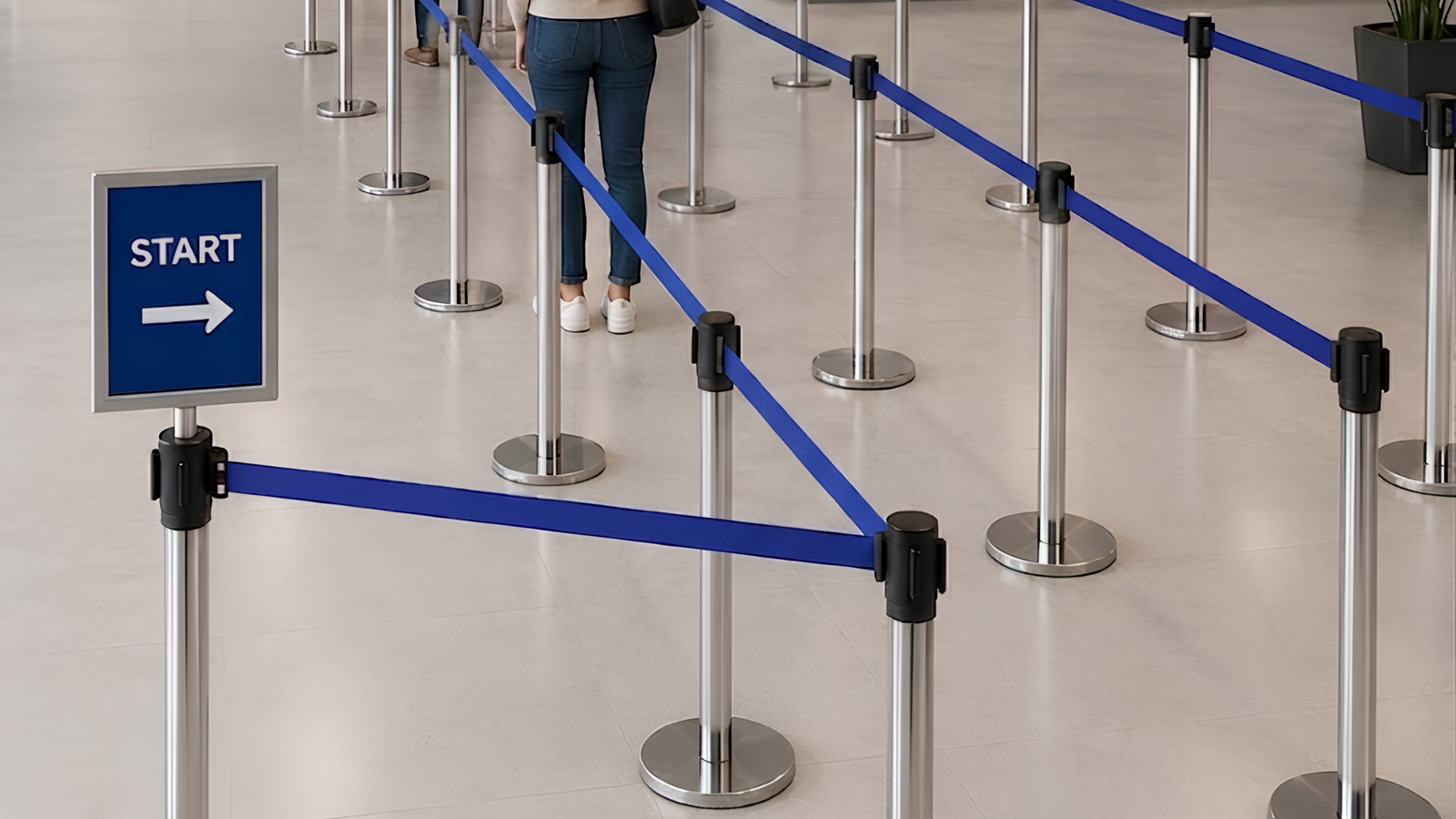Columna ordenadora de fila con cinta retractil